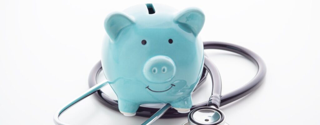 What is an ICHRA image of blue piggy bank and stethoscope