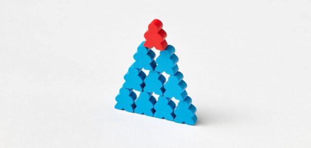 A 3D Image of a pyramid of people, blue people on the bottom and one red one on top