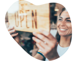 woman open sign on business QSEHRA