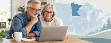 Medicare aged couple looking at laptop about changes in Medicare 2027